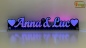 Preview: LED Namensschild Duo Gravur "Anna & Luc" + Herzen oder 2 Doppel-Wunschnamen Paar als Konturschnitt - Truckerschild Leuchtschild