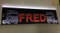 Preview: LED Namensschild Detailzeichnung Zugmaschine Gravur "FRED" oder Wunschname in Großbuchstaben auf Rechteckplatte - Truckerschild Neonschild Leuchtschild