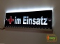 Preview: LED Leuchtschild, Warnschild, Einsatzschild " im Einsatz " Gravur